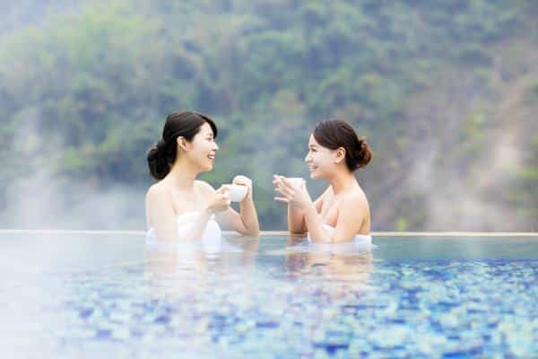 Happy,Young,Woman,Relaxing,In,Hot,Springs