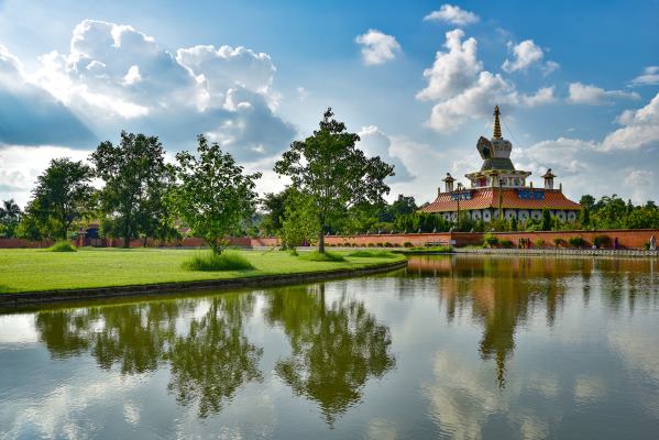 Reflection,Of,A,Buddhist,Temple,On,Water,At,Lumbini,,Nepal,