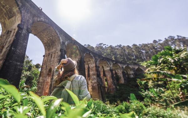 Woman,Looks,At,The,Demodara,Nine,Arches,Bridge,The,Most